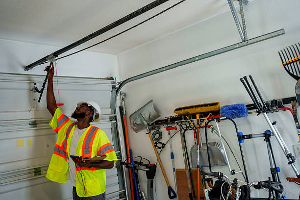 Professional Garage Door Panel Replacement technician working in Troy, NY